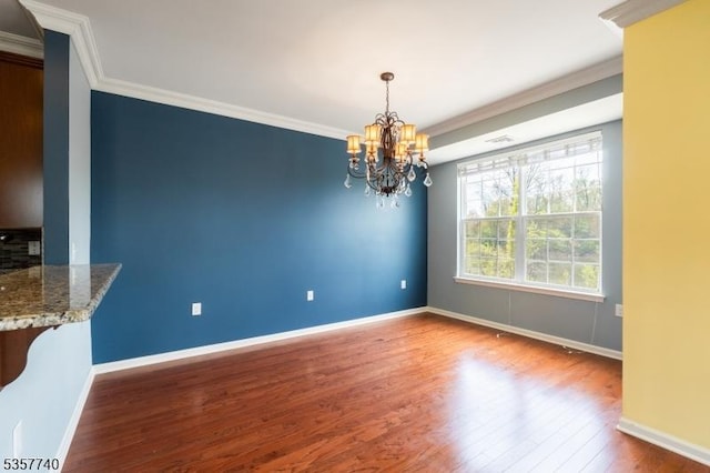 302 Waterview Ct, Hanover Twp, NJ 07927 - unfurnished dining area featuring wood finished floors, a chandelier, ornamental molding, and baseboards