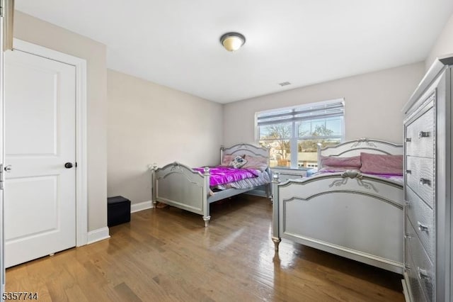 783 Aborn Ave, Woodbridge Twp, NJ 07095 - bedroom with wood finished floors and baseboards