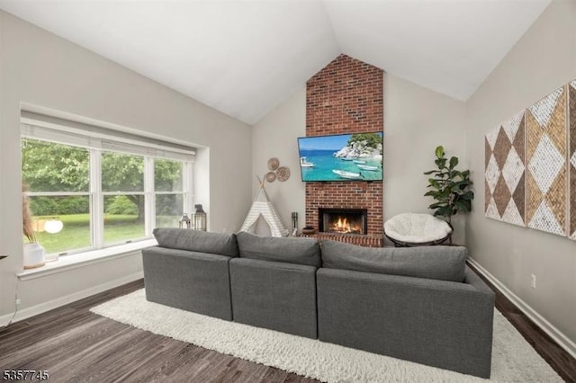 4 Rachel Ct, Greenwich Twp, NJ 08886 - living area with dark wood-style flooring, a brick fireplace, vaulted ceiling, and baseboards