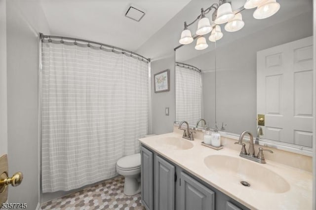 4 Rachel Ct, Greenwich Twp, NJ 08886 - bathroom featuring toilet, double vanity, and a shower with shower curtain
