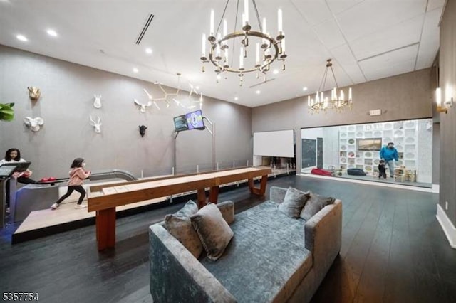 201 Marin Blvd Unit 1507, Jersey City, NJ 07302 - rec room with a chandelier, dark wood finished floors, and recessed lighting
