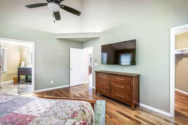 8 Sevell Cir Unit 8, Clark Twp, NJ 07066 - bedroom featuring light wood-style floors, baseboards, a high ceiling, and a ceiling fan