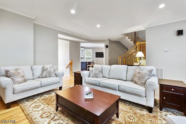 8 Sevell Cir Unit 8, Clark Twp, NJ 07066 - living room featuring stairway, light wood-type flooring, crown molding, and recessed lighting
