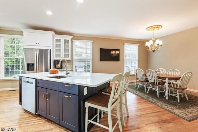 8 Sevell Cir Unit 8, Clark Twp, NJ 07066 - kitchen with stainless steel refrigerator with ice dispenser, dishwasher, a sink, white cabinets, and a chandelier
