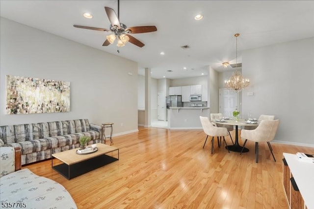 1302 Four Seasons Dr, Wayne Twp, NJ 07470 - living area with ceiling fan, a chandelier, light wood finished floors, baseboards, and recessed lighting