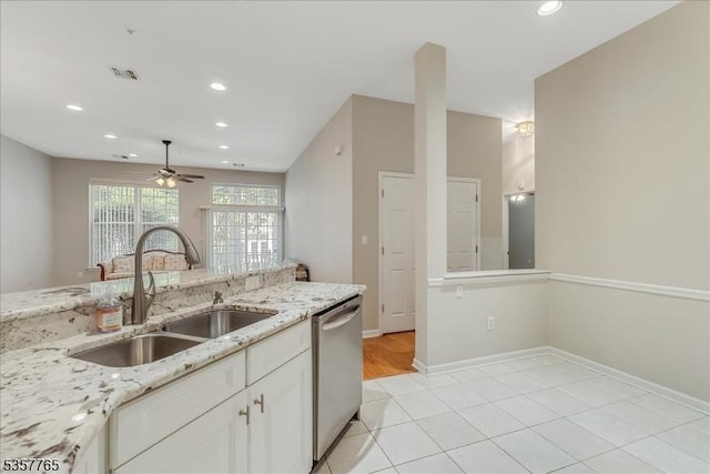 1302 Four Seasons Dr, Wayne Twp, NJ 07470 - kitchen with a sink, stainless steel dishwasher, a ceiling fan, recessed lighting, and white cabinets