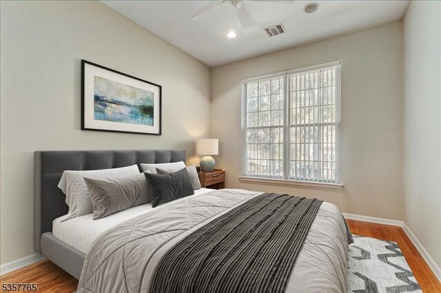 1302 Four Seasons Dr, Wayne Twp, NJ 07470 - bedroom featuring baseboards, wood finished floors, recessed lighting, and ceiling fan