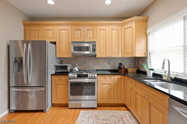 15 Riga Ct, Scotch Plains Twp, NJ 07076 - kitchen with stainless steel appliances, a sink, light wood-type flooring, tasteful backsplash, and recessed lighting