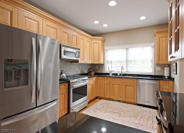 15 Riga Ct, Scotch Plains Twp, NJ 07076 - kitchen featuring appliances with stainless steel finishes, a sink, recessed lighting, backsplash, and light brown cabinets