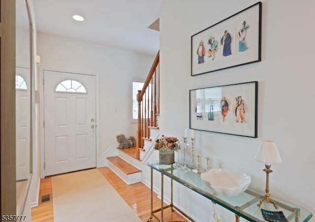 15 Riga Ct, Scotch Plains Twp, NJ 07076 - foyer entrance with stairs, light wood-style floors, healthy amount of natural light, and recessed lighting