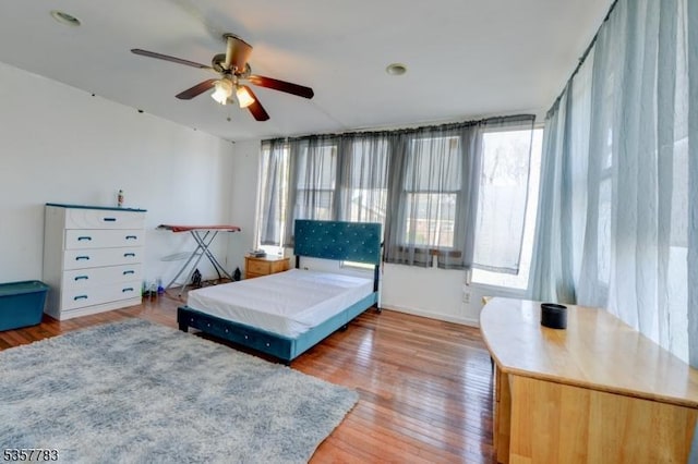 111 Long Hill Rd, Little Falls Twp, NJ 07424 - bedroom featuring light wood-style floors and ceiling fan