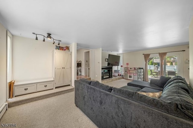 40 Laura Ave, Nutley Twp, NJ 07110 - living room with carpet flooring, a glass covered fireplace, and a baseboard radiator