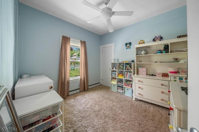 40 Laura Ave, Nutley Twp, NJ 07110 - rec room with a baseboard radiator, a ceiling fan, and carpet