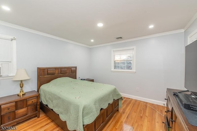 bedroom featuring light wood-type flooring, baseboards, ornamental molding, and recessed lighting