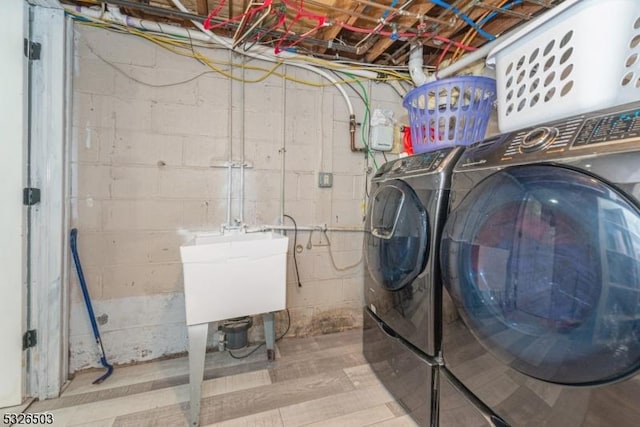 laundry area featuring washer and clothes dryer