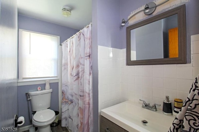 95 Richard St, Rockaway Twp, NJ 07801 - full bathroom with toilet, vanity, and decorative backsplash