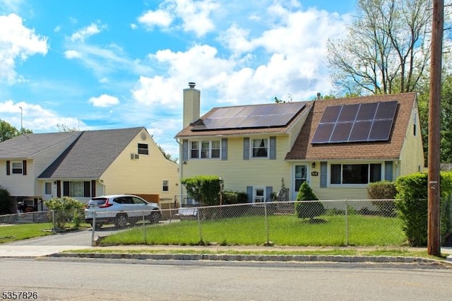 95 Richard St, Rockaway Twp, NJ 07801 - tri-level home with a chimney, solar panels, driveway, and a garage