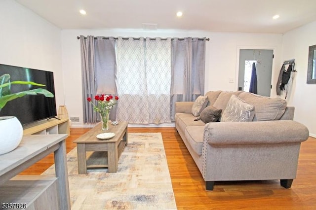 95 Richard St, Rockaway Twp, NJ 07801 - living area with recessed lighting and wood finished floors