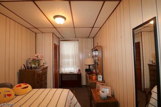 bedroom with a drop ceiling
