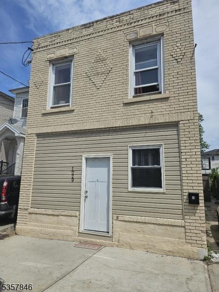 1029 E Grand St, Elizabeth City, NJ 07201 - view of front of house featuring brick siding