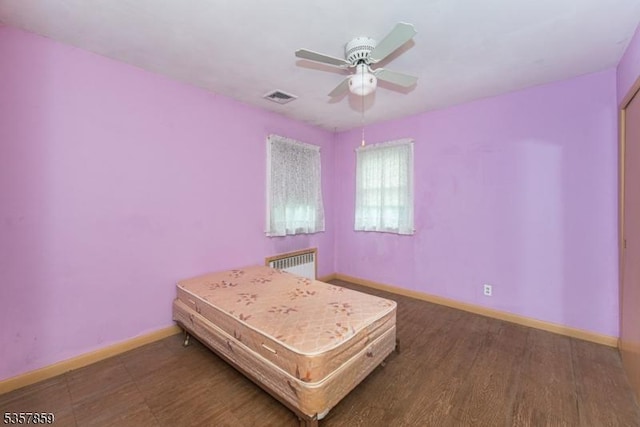25 Pequannock Ave, Pequannock Twp, NJ 07440 - bedroom with radiator, baseboards, ceiling fan, and wood finished floors