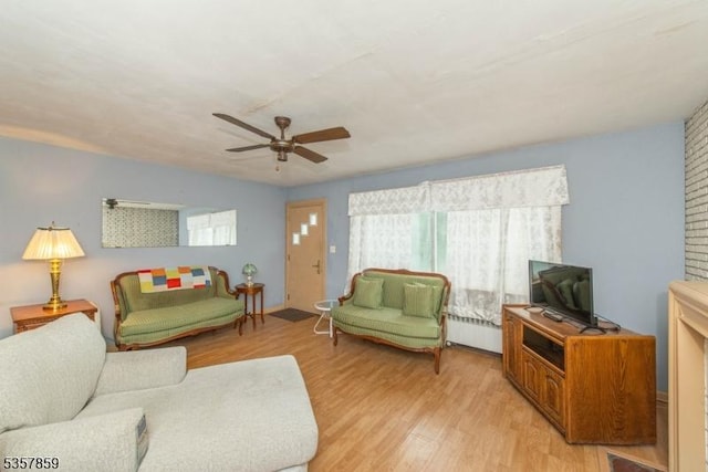 25 Pequannock Ave, Pequannock Twp, NJ 07440 - living area with light wood-type flooring, ceiling fan, and radiator