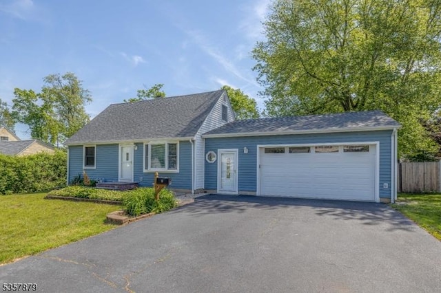 7 Winslow Ave, East Brunswick Twp, NJ 08816 - view of front of house with asphalt driveway and an attached garage