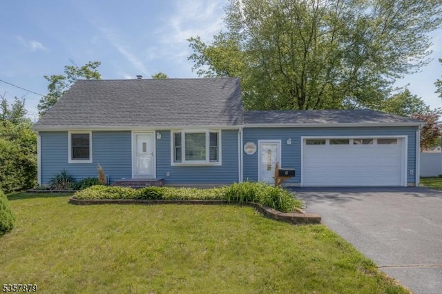 7 Winslow Ave, East Brunswick Twp, NJ 08816 - new england style home with asphalt driveway, a front lawn, and a garage