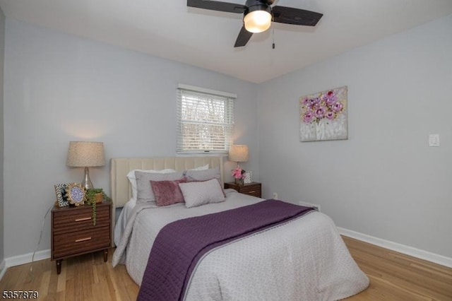 7 Winslow Ave, East Brunswick Twp, NJ 08816 - bedroom with wood finished floors, baseboards, and a ceiling fan