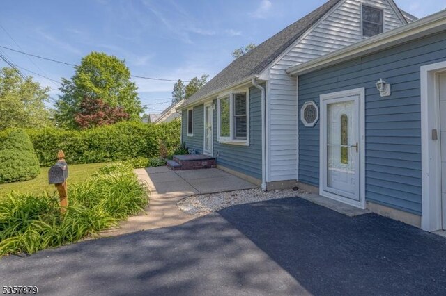 7 Winslow Ave, East Brunswick Twp, NJ 08816 - view of exterior entry with a patio area