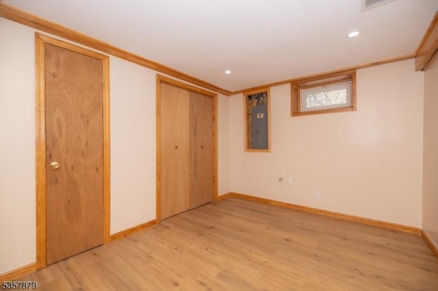7 Winslow Ave, East Brunswick Twp, NJ 08816 - unfurnished bedroom featuring electric panel, light wood-style flooring, baseboards, and recessed lighting