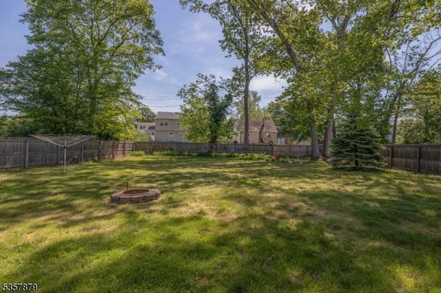 7 Winslow Ave, East Brunswick Twp, NJ 08816 - view of yard featuring an outdoor fire pit