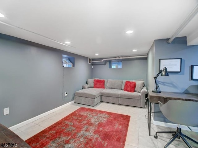 living area with recessed lighting, light tile patterned flooring, and baseboards