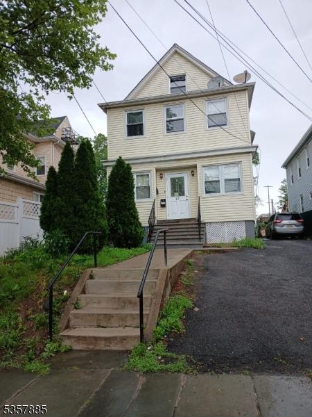 415 Magie Ave, Elizabeth City, NJ 07208 - view of front of house featuring stairs and fence