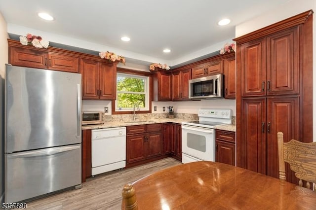125 Annandale High Bridge Rd, Clinton Twp, NJ 08801 - kitchen featuring stainless steel appliances, a sink, light wood-style floors, recessed lighting, and light stone countertops