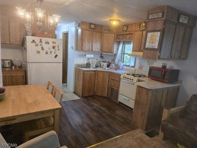 30 Hemlock Vlg, Vernon Twp, NJ 07461 - kitchen featuring white appliances, light countertops, brown cabinets, and dark wood-style flooring