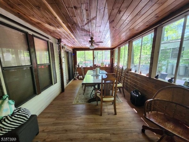 30 Hemlock Vlg, Vernon Twp, NJ 07461 - sunroom / solarium with wood ceiling, outdoor dining area, ceiling fan, wood finished floors, and a deck