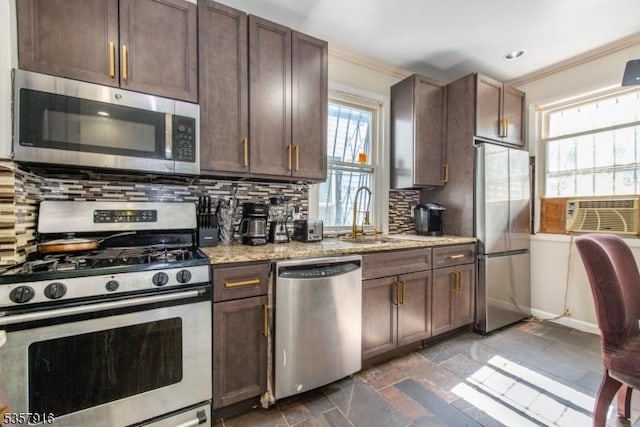 152 Greenwood Ave Unit 2, East Orange City, NJ 07017 - kitchen featuring appliances with stainless steel finishes, backsplash, a sink, cooling unit, and ornamental molding
