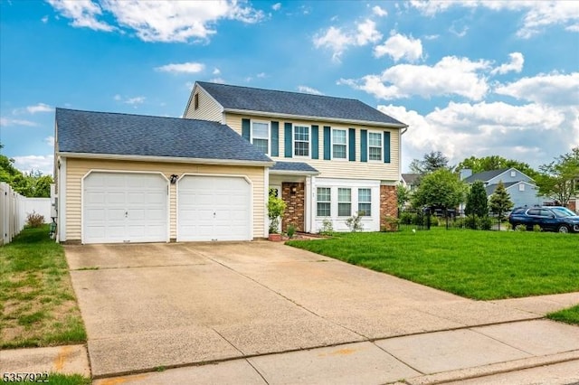 view of front facade featuring an attached garage, driveway, and roof with shingles