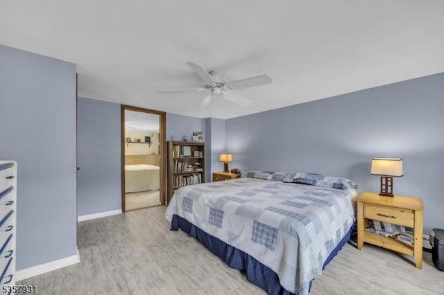 bedroom with light wood finished floors, baseboards, and a ceiling fan