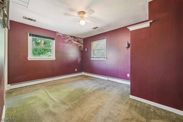 12 Xenia Ct, Mine Hill Twp, NJ 07803 - empty room featuring a ceiling fan, plenty of natural light, carpet, and baseboards