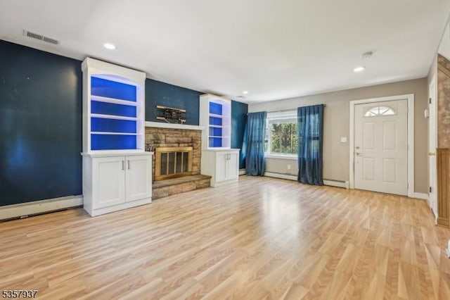 12 Xenia Ct, Mine Hill Twp, NJ 07803 - unfurnished living room featuring wood finished floors, recessed lighting, a fireplace, and baseboards