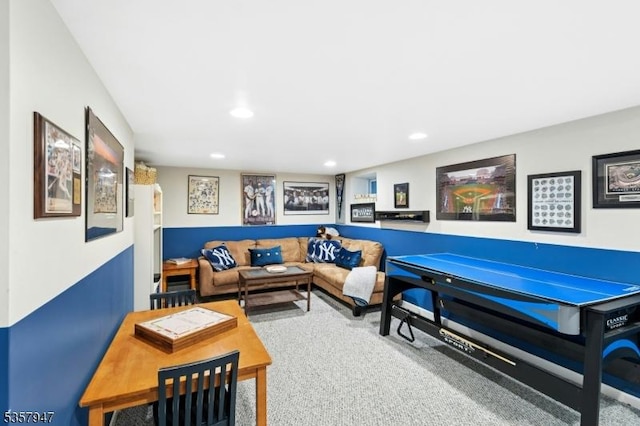 carpeted living area featuring recessed lighting