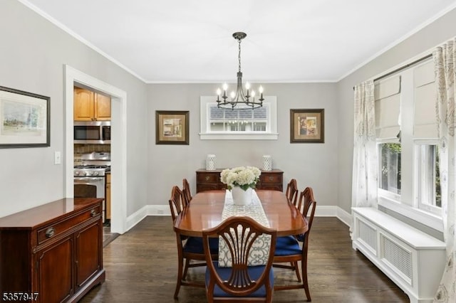 dining space with a chandelier, crown molding, baseboards, and dark wood finished floors