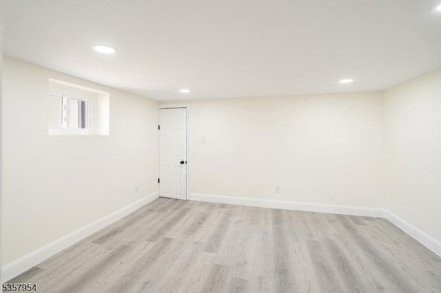 56 Laventhal Ave, Irvington Twp, NJ 07111 - below grade area featuring baseboards, recessed lighting, and light wood-style flooring