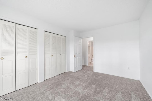 26 Fisher Dr Unit 2704, Franklin Twp, NJ 08823 - unfurnished bedroom with two closets and carpet floors