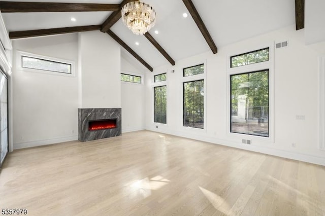 370 Hartshorn Dr, Millburn Twp, NJ 07078 - unfurnished living room with beam ceiling, a fireplace, recessed lighting, light wood-style flooring, and high vaulted ceiling