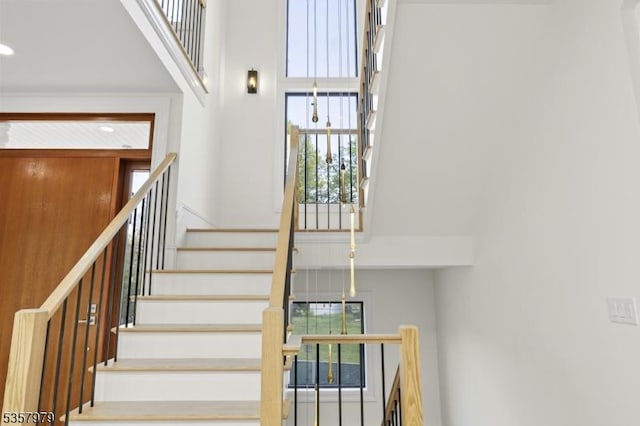 370 Hartshorn Dr, Millburn Twp, NJ 07078 - stairway with a towering ceiling and recessed lighting