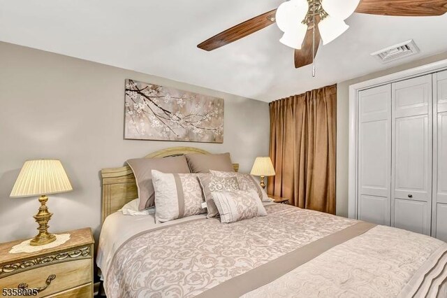 bedroom featuring a closet and ceiling fan
