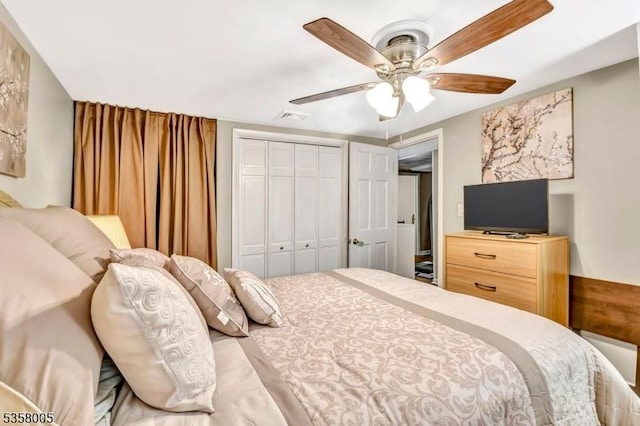bedroom featuring a closet and a ceiling fan